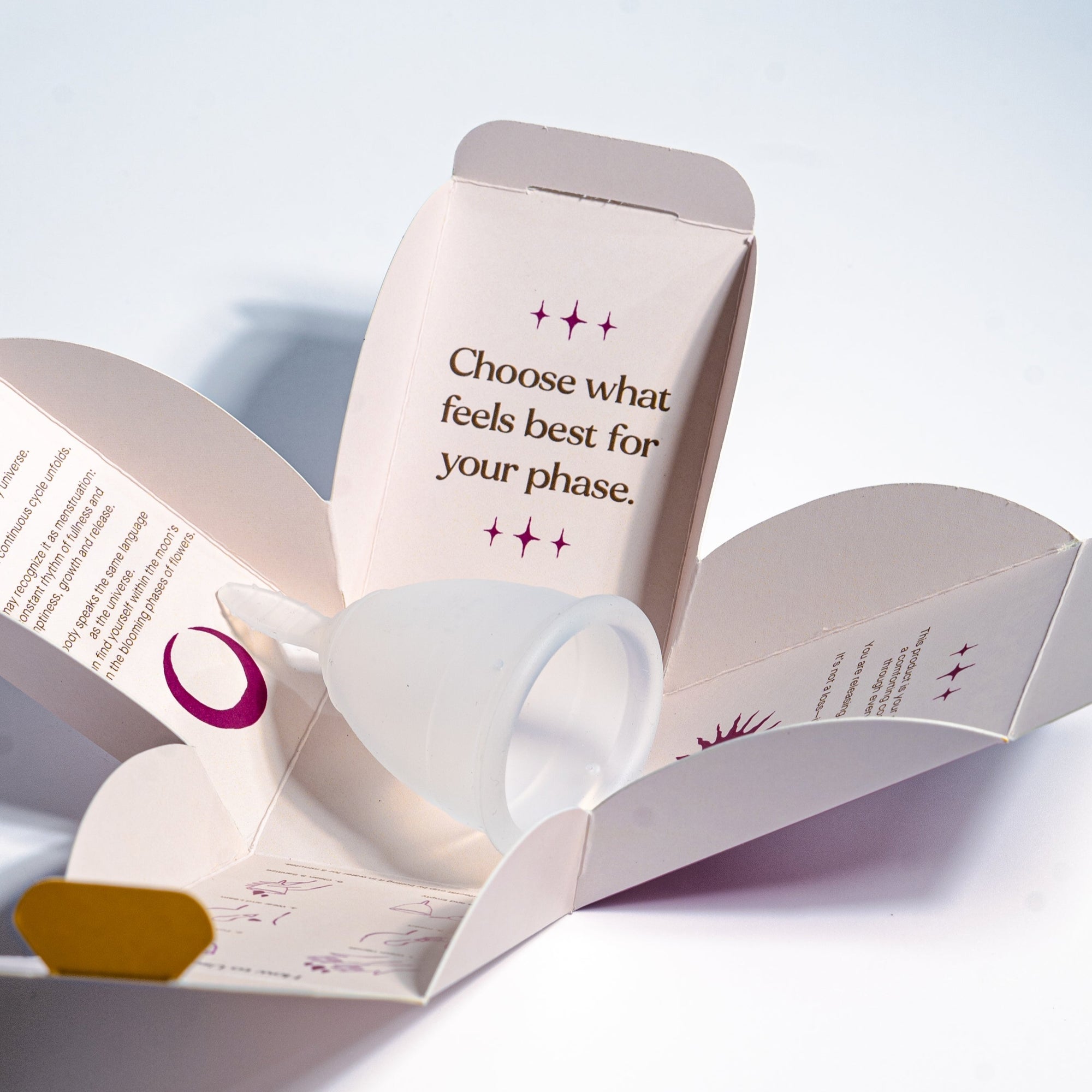 Perfectfit clear white menstrual cup inside the packaging